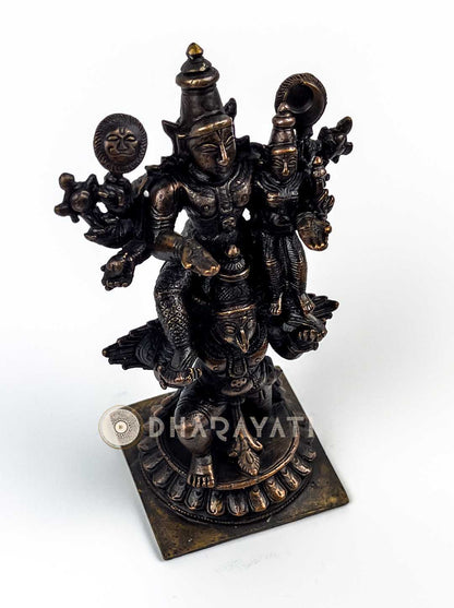 Garuda carrying Lord Vishnu and Lakshmi Devi