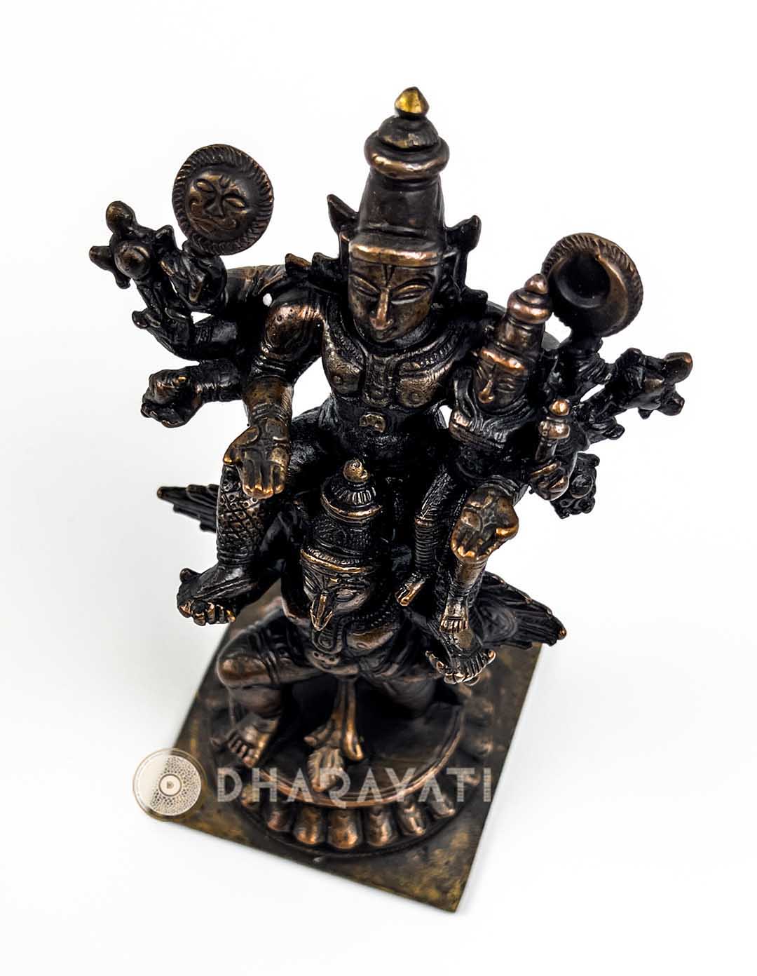 Garuda carrying Lord Vishnu and Lakshmi Devi